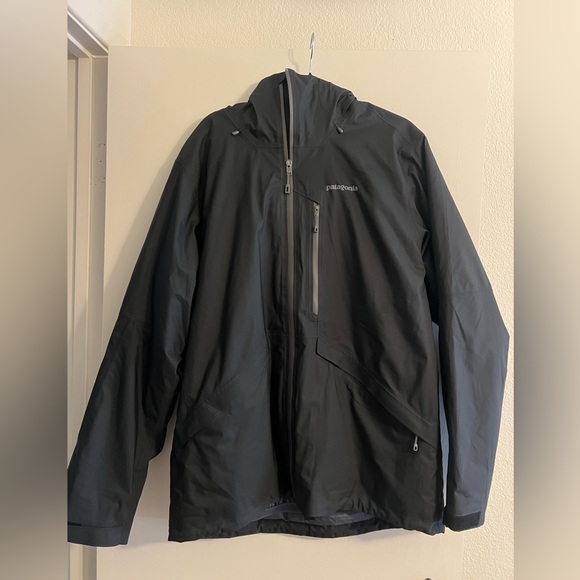 Patagonia Black Raincoat with Hood and Weather-Resistant Fabric
